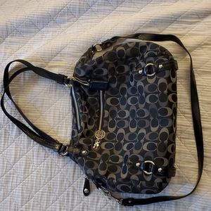 Medium sized, black Coach satchel bag